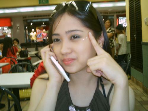 thinking..hehe.. - owkei..this is my picture..after our modeLLing..this was tken at mcdonaLds..whiLe waiting for our food to arrive..