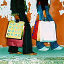 Shopping - People shopping in a mall with their shopping bags