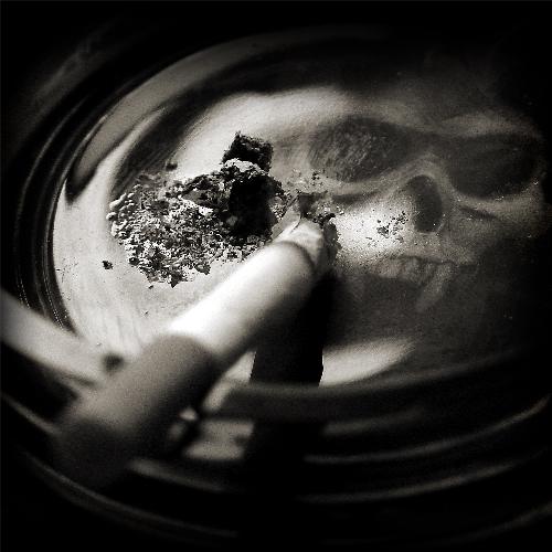 Smoking Kills - this is a very nice manipulation of ciggarette, smoke and death. in black and white colours it looks really deadly.  One should always learn from such things.. Even i 've now quit smoking... not b.coz it not good for me ,, but its not good for others when v smoke..\ .. hope more n more people understand the thing..