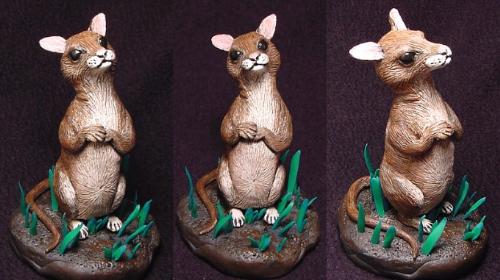 My first sculpture - Scooter - The was my first attempt at sculpting in polymer clay. I followed the instruction from a sculpting book I bought by Catherine Dewey. My mother loved it so much I gave it to her for her birthday!
