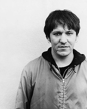 elliott smith is watching you! - elliott smith looking honestly into a camera.