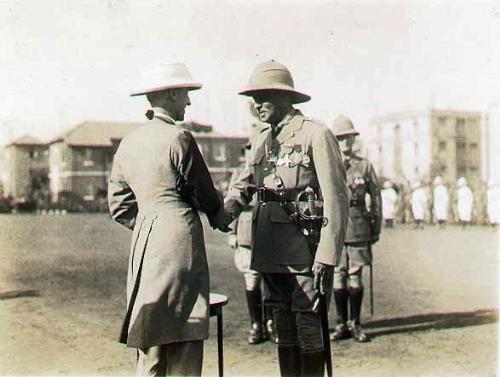 Men in Sola Topees - British policemen in sola topees (hats) in Bombay, in pre-independance India. The hats were remarkbly effective in providing shade and almost indestructable. Unfortunately, they have become almost extinct.