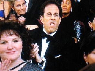 jerry seinfeld - jerry seinfeld in the middle of sniffing up a booger!