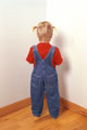 Naughty Child Made To Stand In Corner - a child has been naughty and as punishment is being made to stand in the corner.