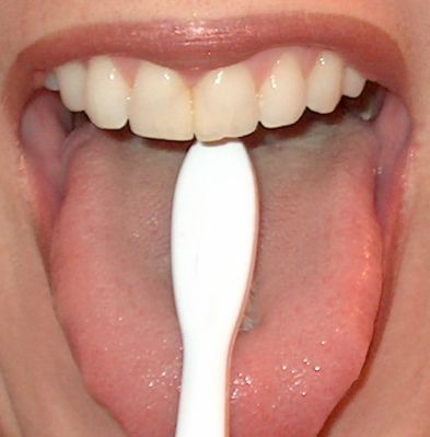 tongue - brushing your tongue