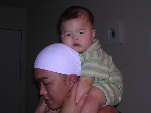 hanging with daddy - He just loves to be on his daddy's shoulders