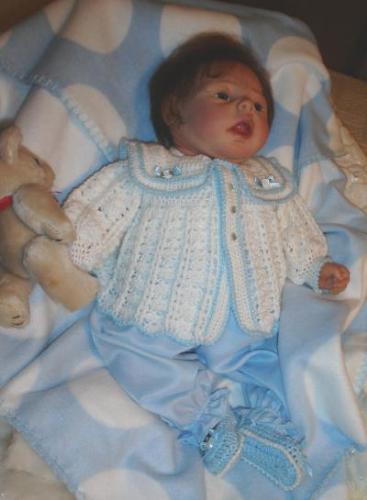 Jody Rae...Reborn Doll - My first completed &#039;reborn&#039; doll. He&#039;s 20" long and weighs 4 lbs. 3 ozs. He has blue eyes and dark brown hair that can be gently combed. He has full vinyl legs and arms with a soft body.