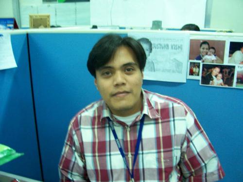 that's me - im joshua. this picture was taken at our office.