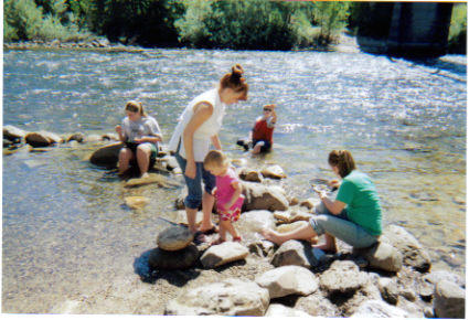 Gold panning on Coloma - This is a picture of me an my kids gold panning in Coloma, CA.