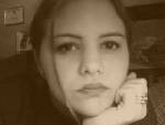 Me - This is me messing around with my camera phone which I love so much. I modified it and changed the color tone to Sepia. Oh aren't I so beautiful!!!