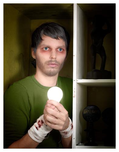 Insomnia - This is a picture taken by a guy named Patrick Bateman. He has taken a picture of himself when he was at severe stages of insomnia. What he is trying to convey in this photo is that with severe insomnia also comes a stage of Paranoia. This you can see in the picture by the cuts on the wrists.