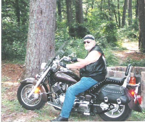 My Husband!! - My husband CC on his bike..We were making a run to the casino's in Loiusana..I won!!!