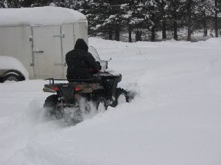 snow removal - fun playing in the snow with atv plowing
