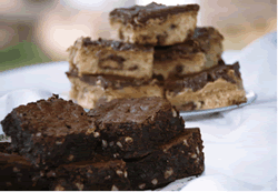 Bethany&#039;s 5 Minute Chocolate Fudge  - One of our first distributors, Bethany Jewell, donated this delicious recipe for the creamiest fudge- one that will make your mouth just water- in less than 5 minutes!! Add butter, milk, and vanilla- nuts optional. Makes 9x9 pan.