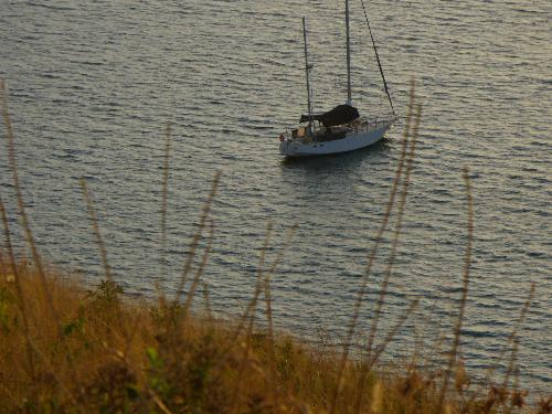The Little Boat - The photo of a sailing boat taken off a cliff overlooking the sea. By looking at things from a different angle and perspective, the whole dimension has changed. Maybe this can help to make the world a better place to live in.