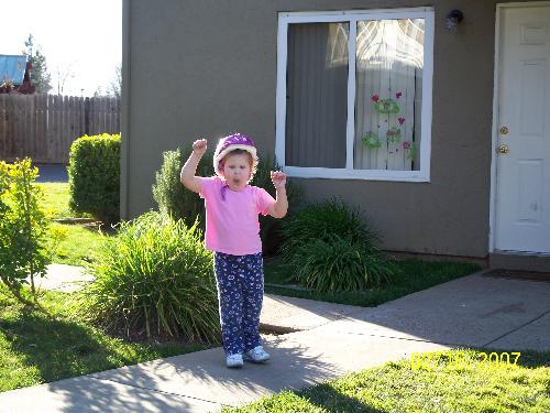 Warm weather a couple weeks ago - This was take when we reached 75 degrees a couple of weeks ago, this is my daughter being silly enjoying the warm weather.