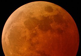Moon Eclipse - a red moon, as we can see the moon when there is a total eclipse. Moon is behind earth so it's hidden from sun, but you can see it because earth's atmosphere will deflects solar rays and change their colour!