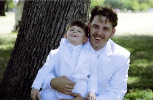 My boys - My husband Jimmy and My son Malachai at our wedding this August.  They looked incredible.