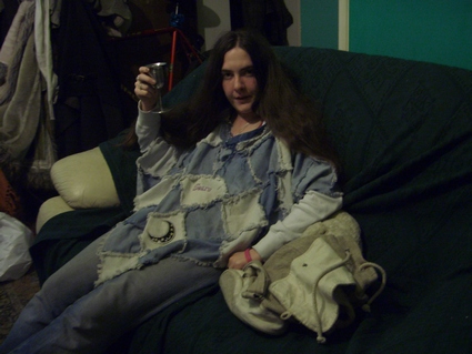 Me in my home made poncho - I made this poncho out of old jeans and denim jackets.