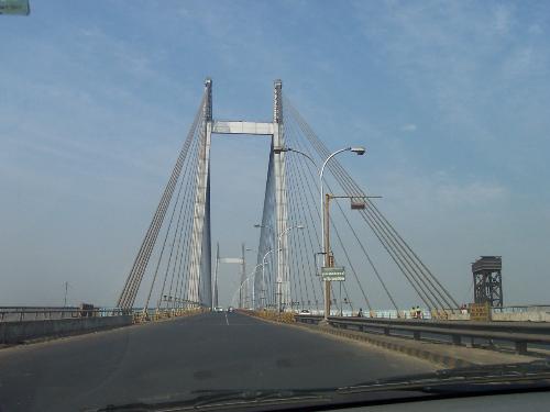 Second Hooghly Bridge - This is Vidhyasagar Satu, more commonly known as the 2nd Howrah Bridge or 2nd Hooghly Bridge, is a bridge crossing over the Hooghly River in West Bengal, India. I took this photo in December 2005. The bridge links Howrah to its twin city Calcutta (aka Kolkata).