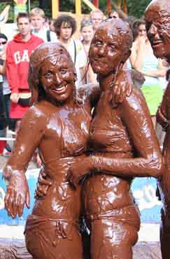 Girls taking Chocolate Bath - Girls taking a Chocolate Bath in a public place.