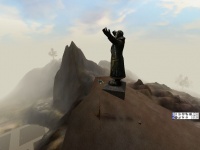 statue on top of a mountain in entropia universe - this is a statue, many believe it to be 'lootius' the god of loot inside the entropia universe.  http://entropiauniverse.com