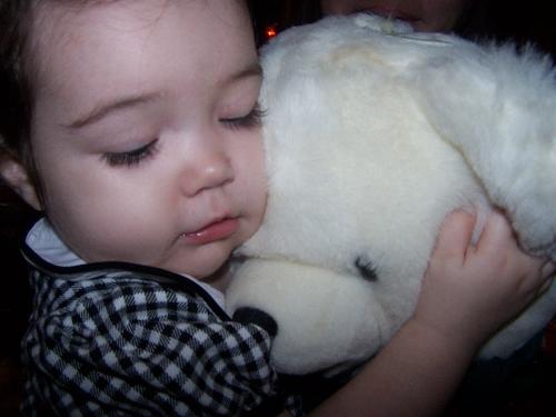 had kids - My daughter giving her favorite teddy bear some tender loving care.