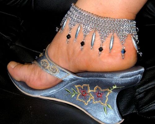 Beaded Anklet - This is an anklet I made last summer. I got several orders just from wearing it around town and to gigs. It's made of aluminum wire, silver melon beads and glass aurora borealis beads using a chainmail patterns called European 4 in 1.