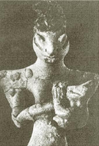 reptile-aryan symbol - a reptile statue found in graves of the ubaid people who live in what is now eraq up to around 4,000 bc. nothe and baby depicted with lizardlike features. this culture predates the venus cataclysm which probably forced the surviving reptilians or into another dimention.