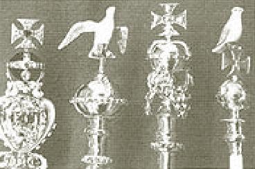 reptile-aryan symbol - doves on the sceptres of british royalty the dove is the symbol of queen semiramis, nimrod partner in babylon.