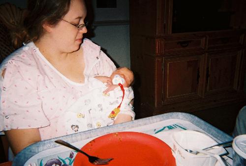 Hospital Picture - Here is me and my son just a day old, at the hospital after i gave birth. he is my little Boo-Bear lol!!