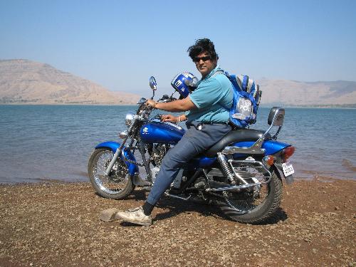 my bike and me - i rode my bike into dhom dam backwaters. it was great and i washed her.