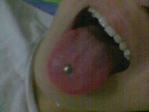 my own dot - thats my tongue it has a pierce on it i got it last 7 years ago ouchless i love it flirty live it