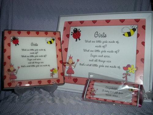 Girls Gift set - What are little girls made of? this very cute set features a framed 8x10 page that can be hung on the wall or placed on the desk or side table. A 6x6 ceramic tile that has been specially coated to preserve the image and a wrapped hershey chocolate bar. Each item is available as an individual item or the whole set as a unit.