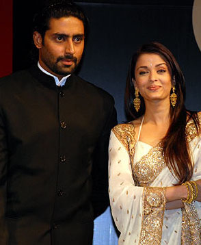 abishek and aishwariya rai - Abishek standing with Aishwariya rai.