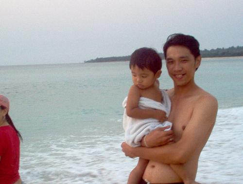 at the beach - father and son
