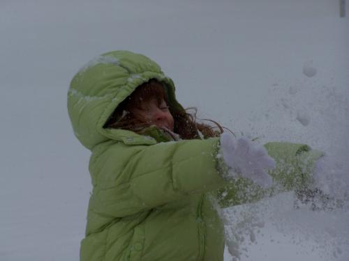 Sydney - My lovely adopted 4 year old playing in the snow. This is just the perfect photo of her in action. That red hair up against that white white snow!