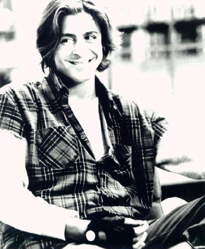 As John Bender - One of the nine original members of the 1980s 'brat pack', along with Andrew McCarthy, Mare Winningham, Anthony Michael Hall, Demi Moore, Rob Lowe, Molly Ringwald, Emilio Estevez and Ally Sheedy. Judd Nelson starred in such movies, 'Making the Grade', 'Fandango', 'The Breakfast Club' and 'St. Elmo's Fire'. With his privileged upbringing, Judd could have brought the right degree of preppy-smarmyness to any number of vapid roles, but his intense stare and dark smoldering looks gave him a hint of danger which added to his credibility in films like the Billionaire Boys Club, From the Hip and New Jack City. He later stared in the tv show 'Suddenly Susan.'