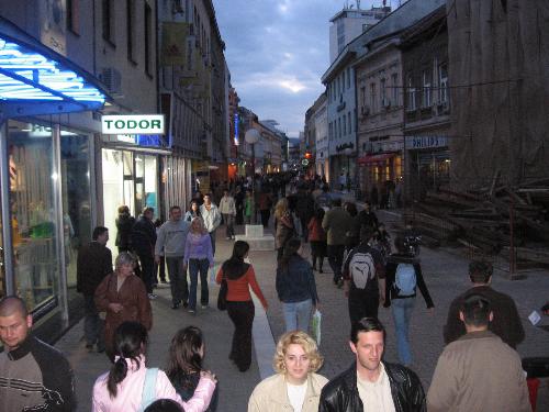 Main street in Banja Luka (Bosnia), full of young  -  Before trip I was told that in Banja Luka (capital of'Republika Srbska',serbian par of Bosnia) there are 7 girls on 1 man. I didn't belive. But whene we arrived there, I realized in moment that stories are true: streets are full of young and very nice girls, most of them dressed in short skirts.NO, they are NOT prostitutes, they are just dressed like prostitutes. It's heaven for men. I'll upload other pictures with Serbian girls in Bosnia (I writed'Serbian girls' becouse on this trip we saw that girls are walking on streets only in Serbian part of Bosnia, muslim part of Bosnia is almost girl-empty)