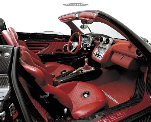 Pagani Zonda F Roadster interior - Even the interior is to-die-for. What amazing craftsmanship using leather, carbon fiber, aluminum and wood trims. Class, elegance and quality right down to the finest detail.