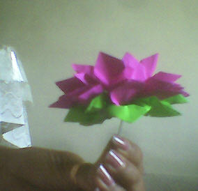 pink flower - i made this flower in a bit different way than it was supposed to be.. but the good thing is that it has turned out to be nice looking :)