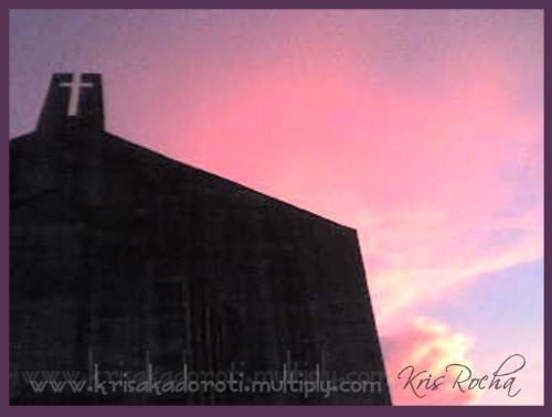 holy cross - i took this picture last November 2006 using a camera phone. I did not made any photo retouching on this one, i guess you can already see why. Daybreak colors are nice, isn't it?
