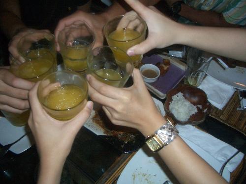 cheers! - those hands are ours! we celebrated our graduation and we drank a lot of Dalandan Margarita... cheers!