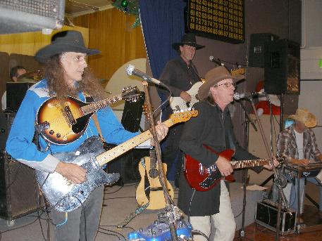 Mandolin - Warren Keats playing guitar and Madolin at The Guild