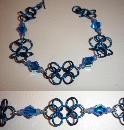 Butterfly link with Swarovski crystal accents - br - Here I used 18 gauge 1/4' colored anodized aluminum rings with Swarovski crystals.