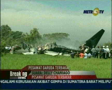 plane crash - Garuda plane exploded after a hard landing in Java, Indonesia. Photo courtesy of MetroTV Indonesia (taken from the news)