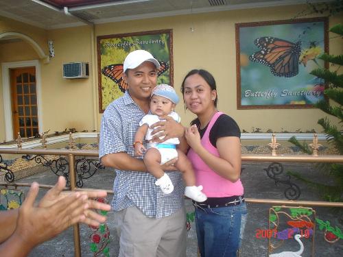 my family - this was taken at waterpark, tubod minglanilla. actually, i have few hours of sleep that day since i had a night shift before the get away. i promised my hubby to go to the place so i cant make an excuse to get more rest. but wen i got to the place, i didnt mind the stress anymore. it's enough that i could see my family enjoying, and it would compensate all the stress. this day was my baby's first pool adventure. my hubby was thrilled the most.