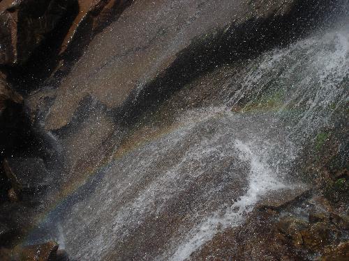 Rainbow on the hills - It was rainy day and water was falling everywhere.If you look at the picture you can very well see the rainbow on the hills.What a beaty nature does show!!