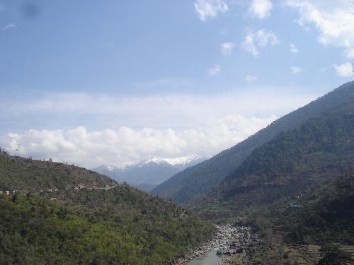 A beautyfull valley surrounded by hills - I study in a technical university and its stood right behind the hill which is in the left side in the foto.But more interesting is the siver which flows between the two hills and thus makin the scenario beautyfull