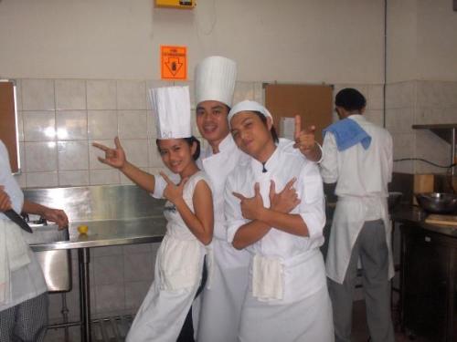 at kitchen,, - thats me the only girl,,obviously,,hehehe,,we are in the kitchen taking a snap picture while cooking,,im a HRM student,,